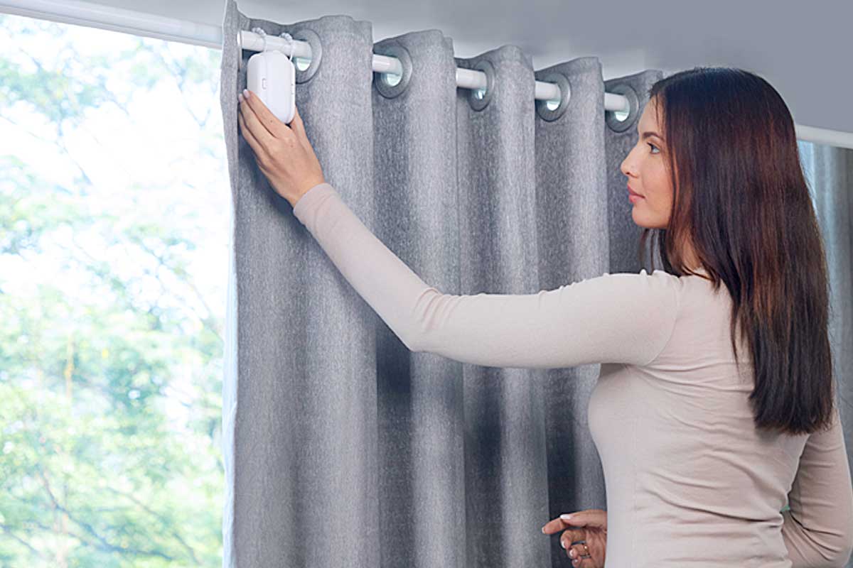 https://www.thesuperboo.com/wp-content/uploads/2019/10/Smart-Automatic-Curtain-Opener-Robot-Works-With-Alexa-SwitchBot-Curtain.jpg