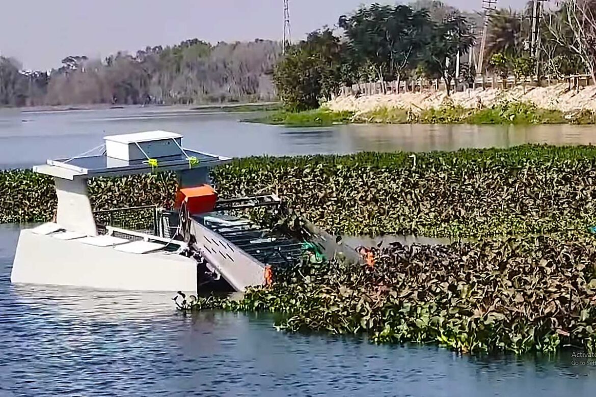Clearbot in action, collecting floating trash from a polluted waterway.