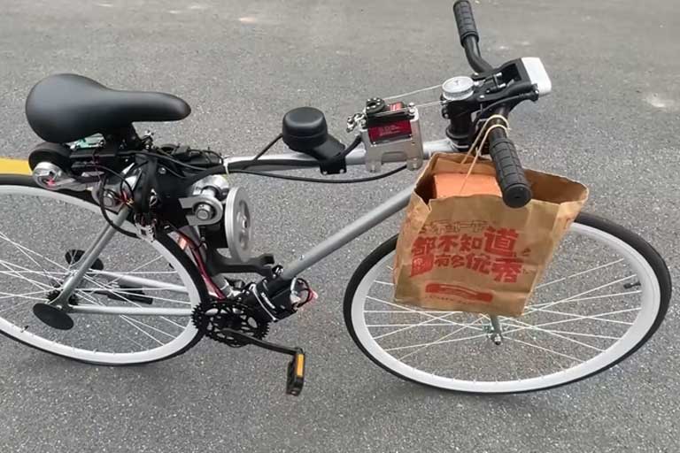The autonomous bike completes a self-driving test, showcasing its capabilities.