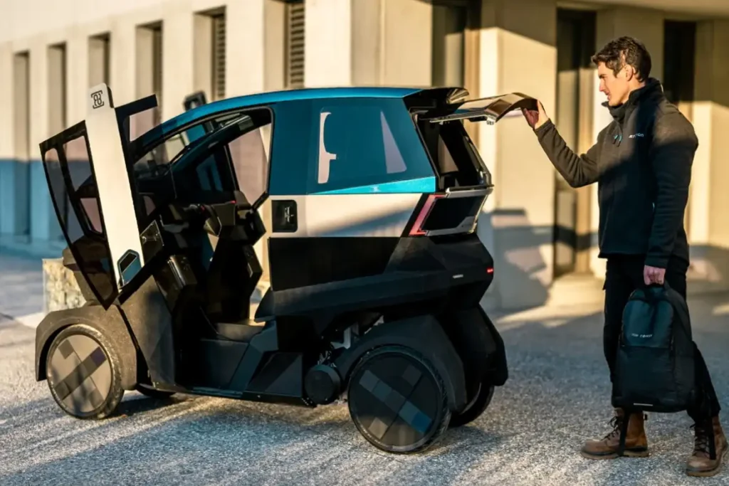 Tilting Electric Microcar with Motorcycle Agility and Car Safety