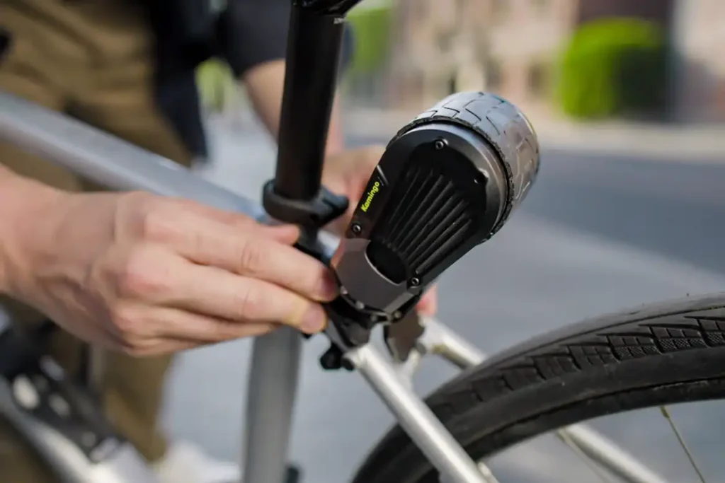 The full Kamingo e-bike kitsetup: handlebar controller, bottle-cage battery, and rear motor.