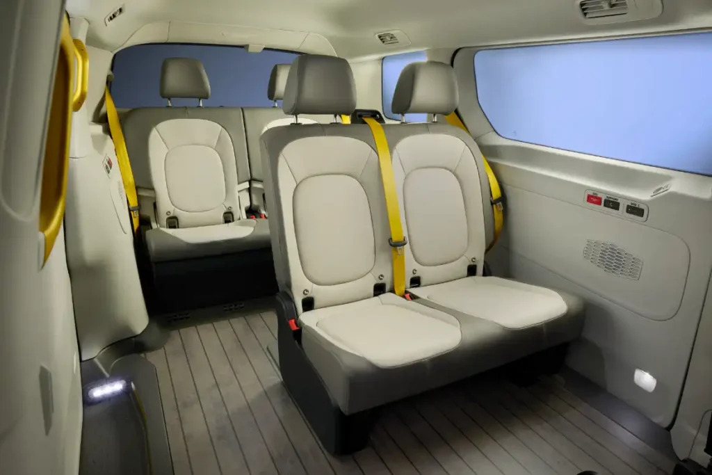 Accessible cabin design with seat-side controls and Braille labels